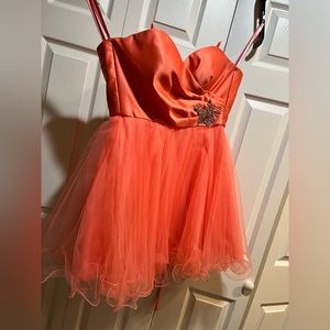 Mori Lee brand. Size 4. Color is coral